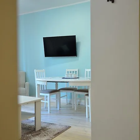 Victus Apartamenty, Tomkos